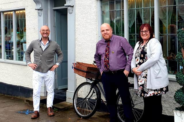 Expert David Harper with Mark and Tracy Witherington outside Pickering Antiques and Collectables.