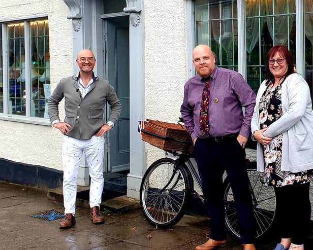 Expert David Harper with Mark and Tracy Witherington outside Pickering Antiques and Collectables.