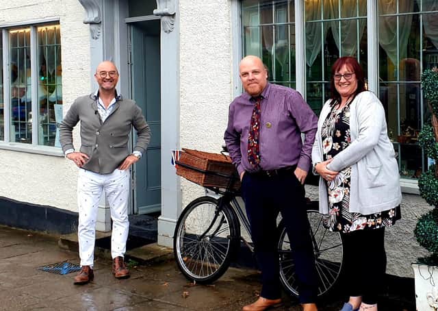 Expert David Harper with Mark and Tracy Witherington outside Pickering Antiques and Collectables.