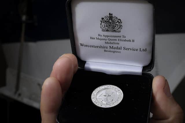 The medal Chris received for 40 year service to RNLI.