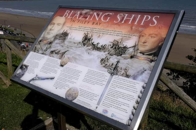 Plaque situated above the bay.