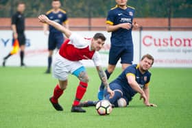Angel Athletic (blue kit) play Eastfield United while Trafalgar (red kit) have to wait a further week to get back into action