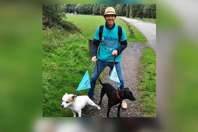 Anthony Bates with his dog Bella who had to be put down (left), and his other pet Lola.