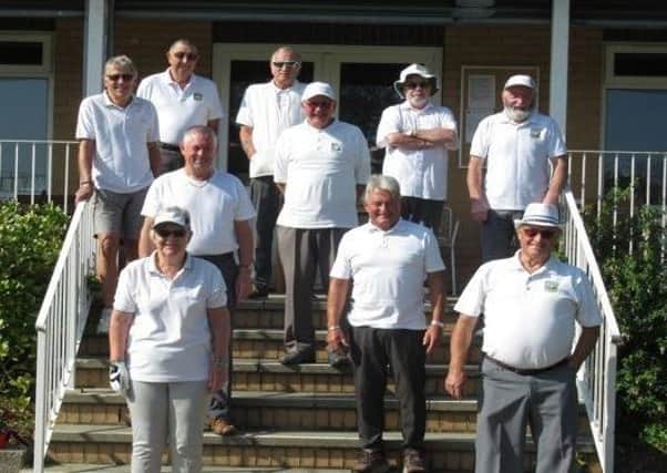 Cayton Bowling Club members received £1,000 to repair pathways around their green.