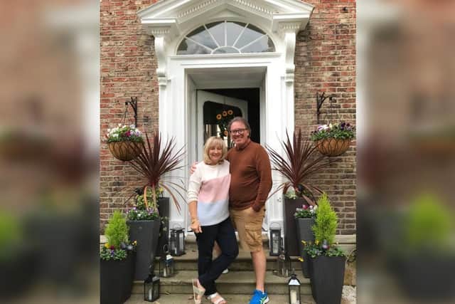 Polly and Andy Brown outside Highgate House