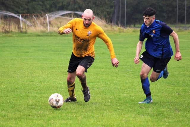 Newlands Reserves' Jamie Gallagher gets away from Edgehill Reserves' two-goal hero Jake Reeves
PHOTO BY ALEC COULSON