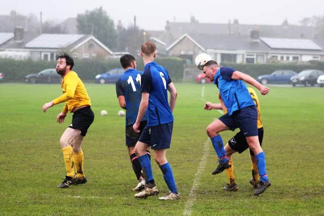 Edgehill Reserves' Andy Noon wins a header

PHOTO BY ALEC COULSON