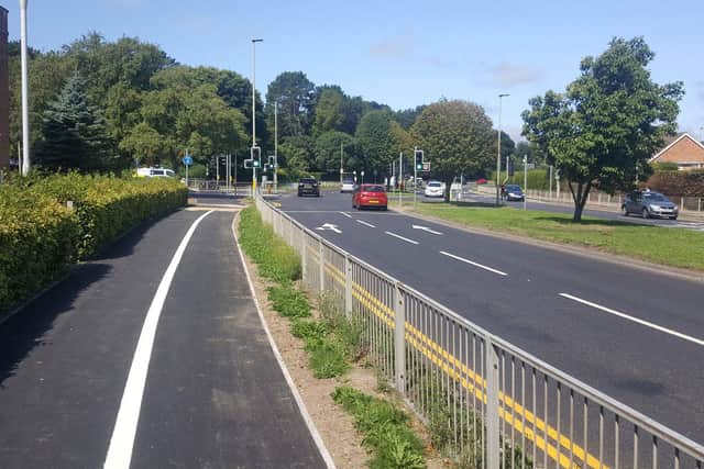 The stretch of Scalby Road approaching the Woodlands Drive turn; after that, two lanes merge into one