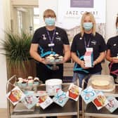 Linda Shaw, Liz Jones and Tracey Potter with the tasty treats trollies.