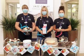 Linda Shaw, Liz Jones and Tracey Potter with the tasty treats trollies.