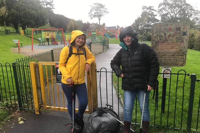 Meshell Heelbeck (left) and Claire Howard litter picking in Falsgrave Park.