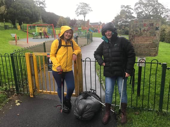 Meshell Heelbeck (left) and Claire Howard litter picking in Falsgrave Park.