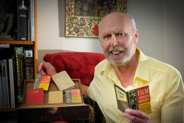 Martin with some of the diaries from his 60 year collection.