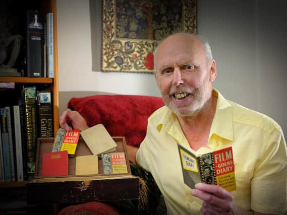 Martin with some of the diaries from his 60 year collection.