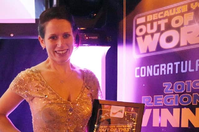 Laura is pictured receiving her regional award at York Railway Museum last year.