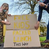 A sign is put up advertising free packed lunches being given out at a community centre in Birmingham, following the campaign inspired by Marcus Rashford.