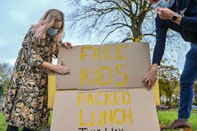 A sign is put up advertising free packed lunches being given out at a community centre in Birmingham, following the campaign inspired by Marcus Rashford.