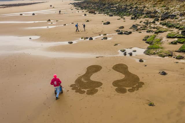Giant footprints at Cayton Bay