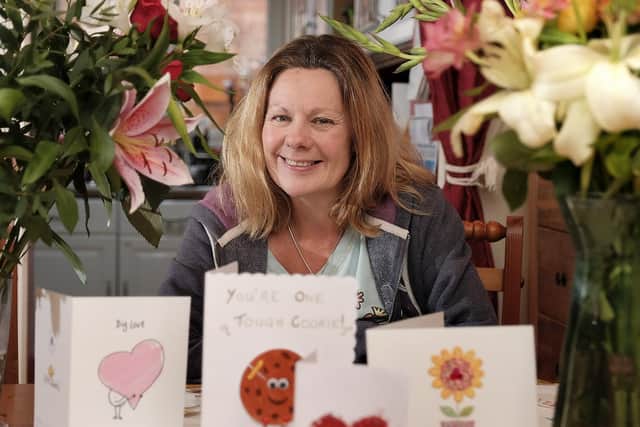 Sharon Stone with flowers and cards of support