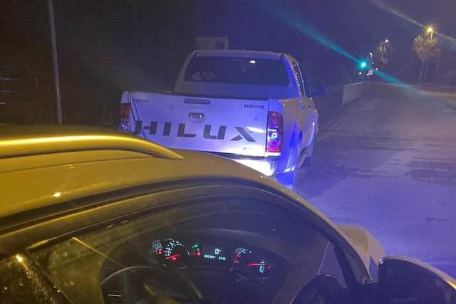 The Toyota is stopped on Friday night