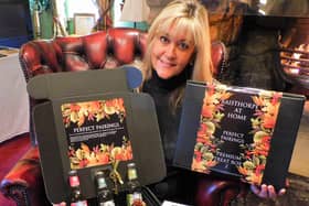 Julia Medforth, MD of Raisthorpe Distillery, is pictured with the treat boxes.