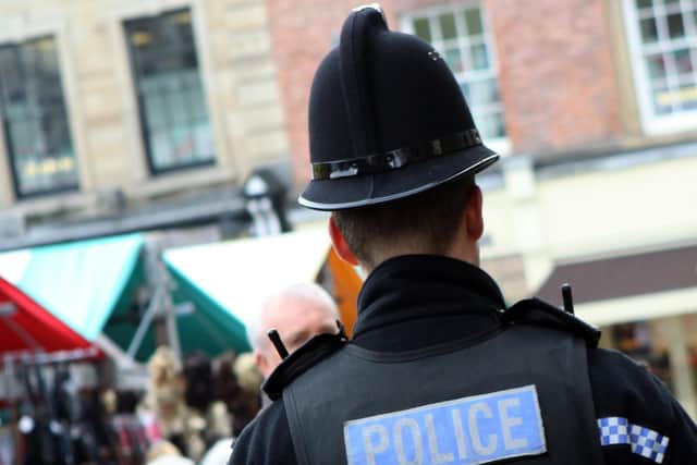 Police arrested a woman after a car crashed into a signpost in Scarborough.