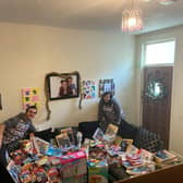 Joe and Courtney show off the toys they have collected