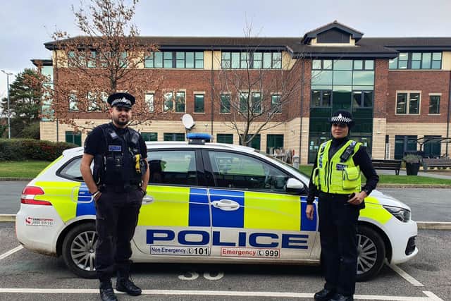 Police constables Arfan Rahouf and Uzma Amireddy, who have designed a police uniform which incorporates the hijab head covering. Picture: Twitter