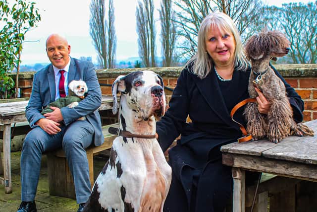 Canine Concierge Angela Egan is pictured with Talbot Hotel general manager Steve Brown and their pets Anya, Nora and Darcy. Photo taken by Merry Councell
