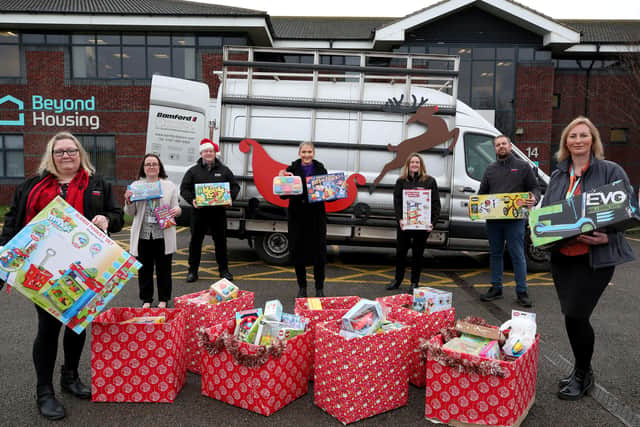 These hampers filled with toys donated by Bamford Doors and KMS will be distributed by Beyond Housing. Photo by Chris Booth