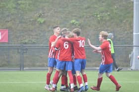 Ben Leeson is congratulated for his match-winner against Harrogate Town.