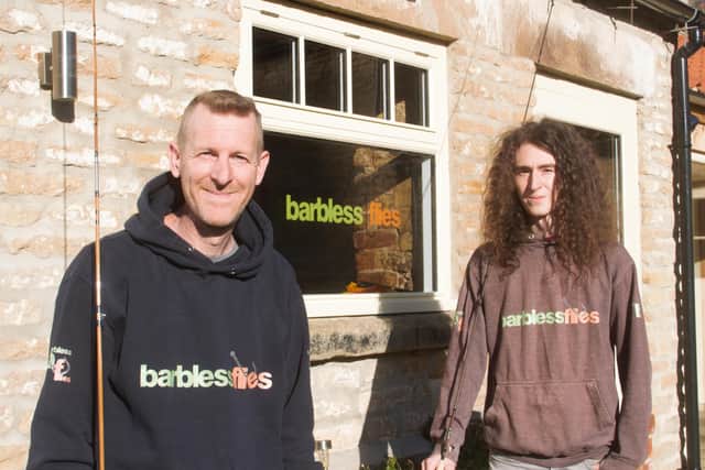 Richard Fieldhouse, founder of Barbless Flies, with son Jack (right) outside their new premises on the Dawnay Estates at Wykeham.