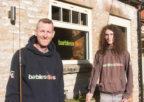 Richard Fieldhouse, founder of Barbless Flies, with son Jack (right) outside their new premises on the Dawnay Estates at Wykeham.