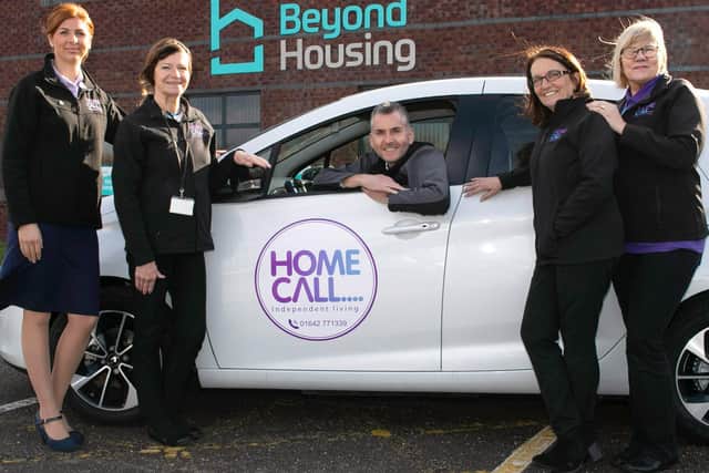 Beyond Housing’s Jason Lowe is pictured with the HomeCall team.