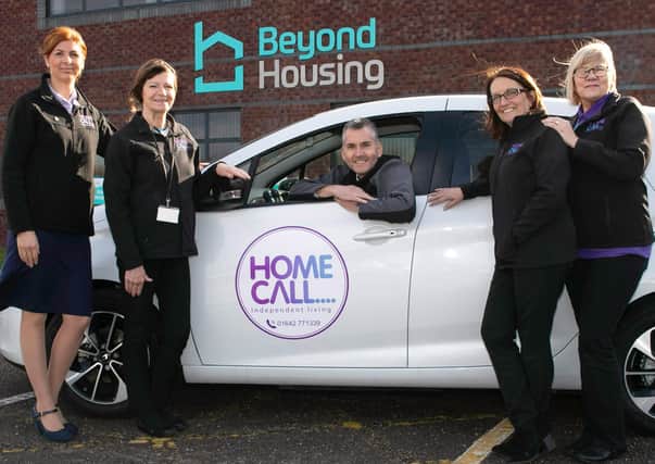 Beyond Housing’s Jason Lowe is pictured with the HomeCall team.