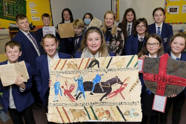 Filey Ebor school students celebrate their history project with History teacher Ms Williams.