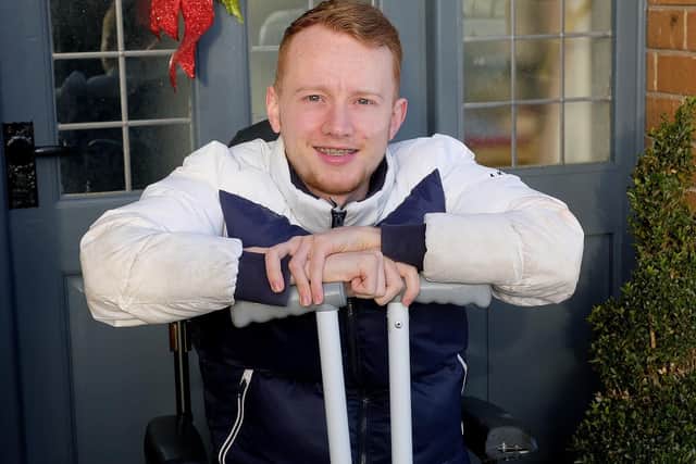 Liam Critchett has defied doctors by taking his first steps unaided.