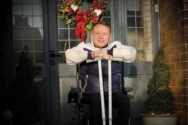 Liam Critchett has defied doctors by taking his first steps unaided.