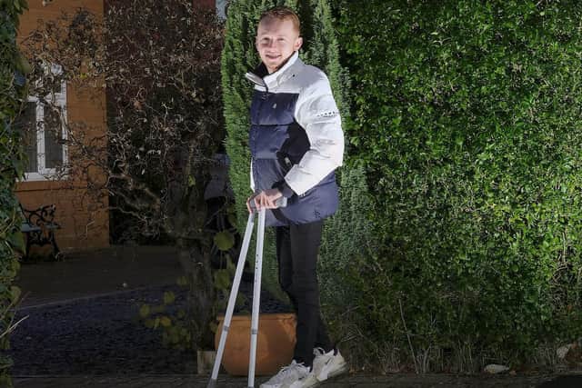 Liam Critchett has defied doctors by taking his first steps unaided.