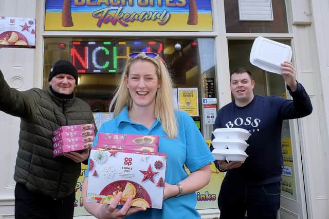 Beach Bites on Eastborough is offering a Christmas meal for anyone in need, Pictured are staff Trevor Bloor, Jade Liley and Nathan Pratt.