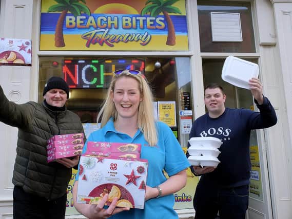 Beach Bites on Eastborough is offering a Christmas meal for anyone in need, Pictured are staff Trevor Bloor, Jade Liley and Nathan Pratt.