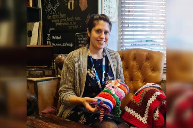 May Liversedge shows off a completed twiddlemuff and shawl