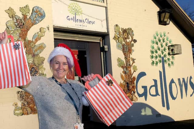 Kimmie Avison with some of the gift bags that will be given to local residents