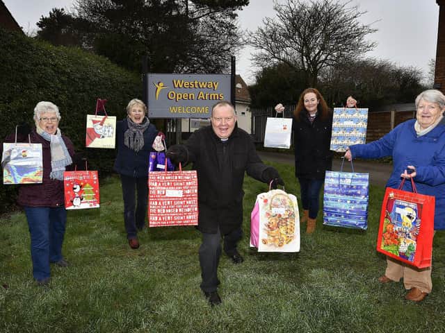 East Ayton church have collected gifts for Eastfield children to hand in at Westway Open Arms. (L-R): Christine Derrington, Angela Adams, Rev Andrew Moreland, Rev Sam Taylor, and Yvonne Quinsey. pic Richard Ponter