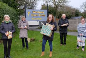Working hard at The Westway Open Arms with charity donations. Oliver Jan Wells Rev Sam Taylor, David Oliver, Rev Jo Parker. pic Richard Ponter