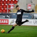 IN SAFE HANDS: Scarborough’s Alfie Burnett in action for Rotherham United in their recent FA Youth Cup clash against Arsenal