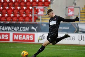 IN SAFE HANDS: Scarborough’s Alfie Burnett in action for Rotherham United in their recent FA Youth Cup clash against Arsenal