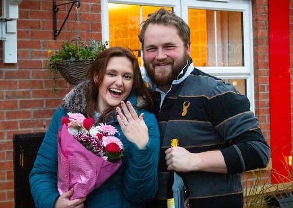 Matt Roberts proposed to Lauren Holmes as they moved into their new home.