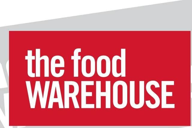 The Food Warehouse logo