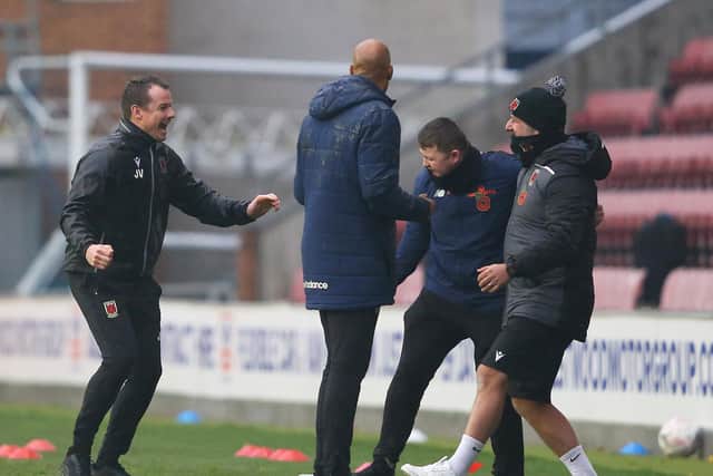 Chorley boss Jamie Vermiglio celebrates at the final whistle during the FA Cup First Round match between Wigan Athletic and Chorley last November